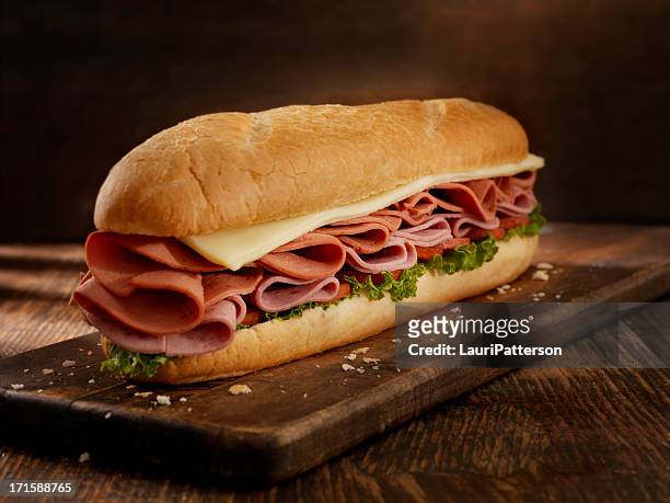foot long pizza sub - pizza with ham stock pictures, royalty-free photos & images