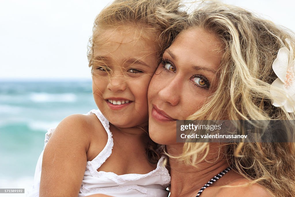 Mother and daughter on the beach