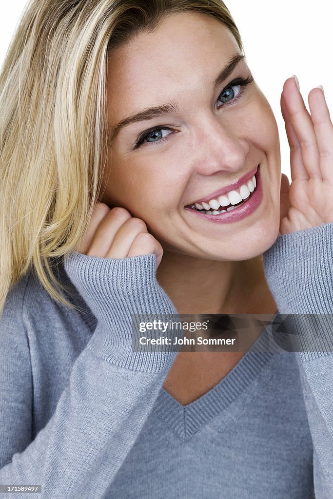 Cheerful young woman with beautiful smile