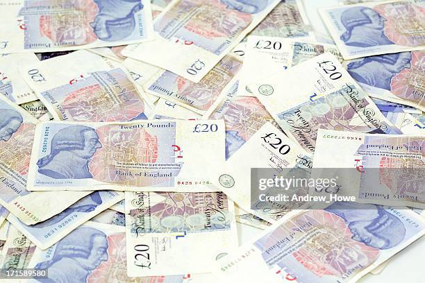 dinero en efectivo - símbolo de la libra esterlina fotografías e imágenes de stock
