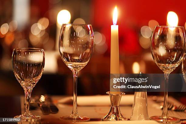 candlelight in gourmet restaurant (close up) - candle light dinner stock pictures, royalty-free photos & images