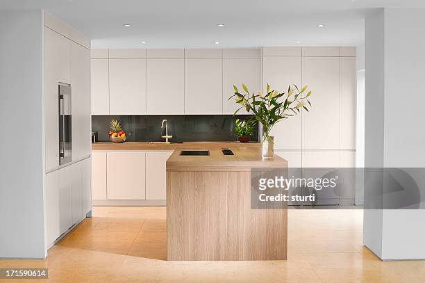 high quality modern kitchen - kitchen island stock pictures, royalty-free photos & images