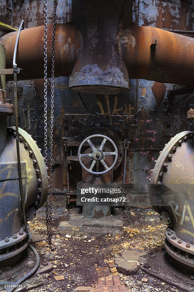 Valve Wheel and Pipes Detail in Abandoned Steel Mill