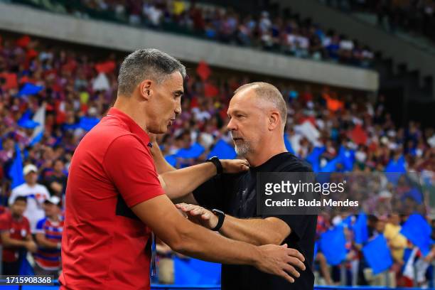 Juan Pablo Vojvoda coach of Fortaleza talks to Mano Menezes coach of Corinthians prior the Copa Sudamericana 2023 semifinal second leg match between...