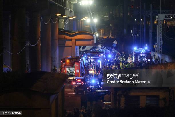 Emergency crew members work at the scene after a bus accident near Venice on October 03, 2023 in Mestre, Italy. A bus belonging to the transport...