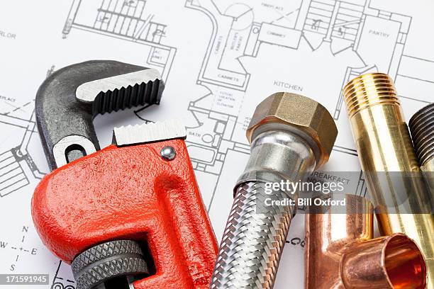 plumber's tools - installing stockfoto's en -beelden