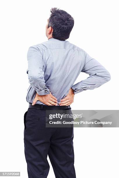 when backpain strikes... - lower back stock pictures, royalty-free photos & images