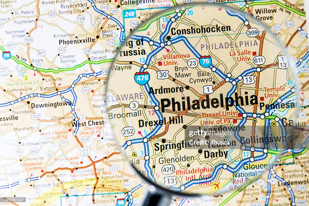Cities under magnifying glass on map: Philadelphia