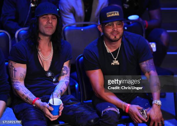 Entertainer Criss Angel and former UFC lightweight champion Anthony Pettis are seen in attendance during Dana White's Contender Series season seven,...