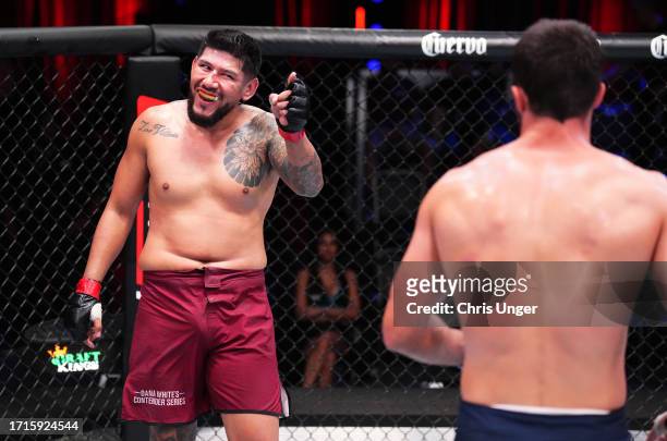 Jose Medina of Bolivia taunts opponent Magomed Gadzhiyasulov of Russia in a light heavyweight fight during Dana White's Contender Series season...