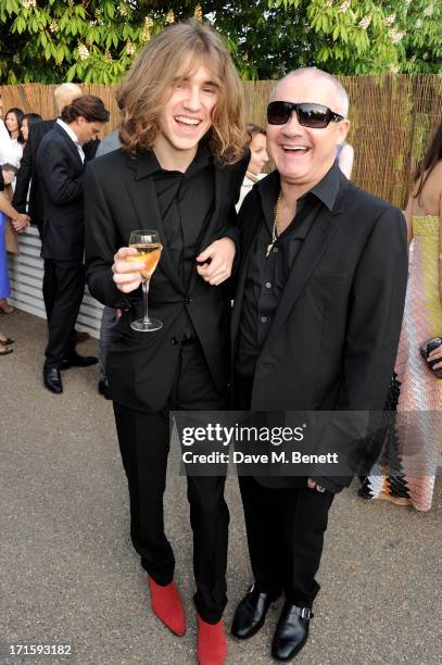 Damien Hirst and guest attend the annual Serpentine Gallery Summer Party co-hosted by L'Wren Scott at The Serpentine Gallery on June 26, 2013 in...