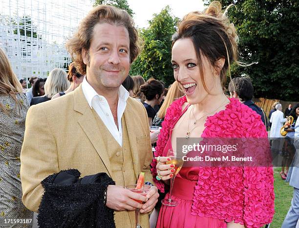 Lars von Bennigsen and Alice Temperley attend the annual Serpentine Gallery Summer Party co-hosted by L'Wren Scott at The Serpentine Gallery on June...