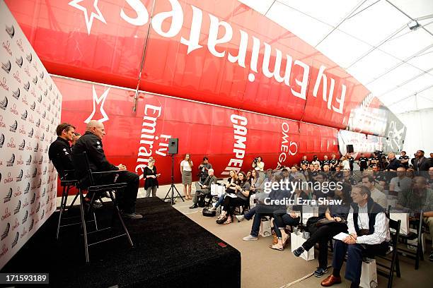 Media gather at the Emirates Team New Zealand Base Camp for a press conference with ETNZ Skipper Dean Barker, Managing Director Grant Dalton and...