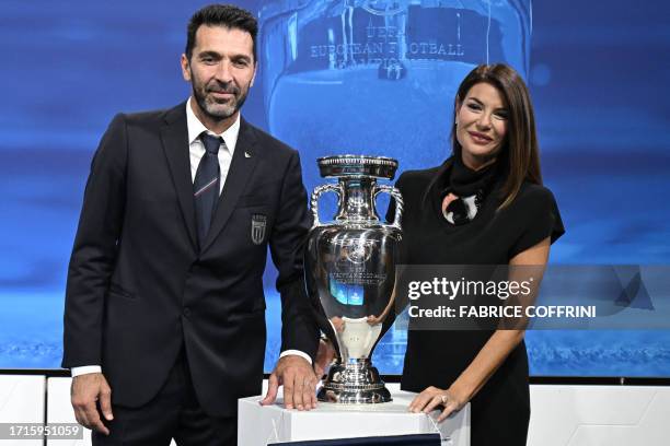 Head of Italian delegation and Italian former professional football player Gianluigi Buffon and Italian TV host and commentator Ilaria D'Amico pose...