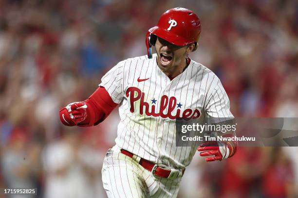 Bryson Stott of the Philadelphia Phillies reacts after hitting a one-run RBI single during the fourth inning against the Miami Marlins in Game One of...