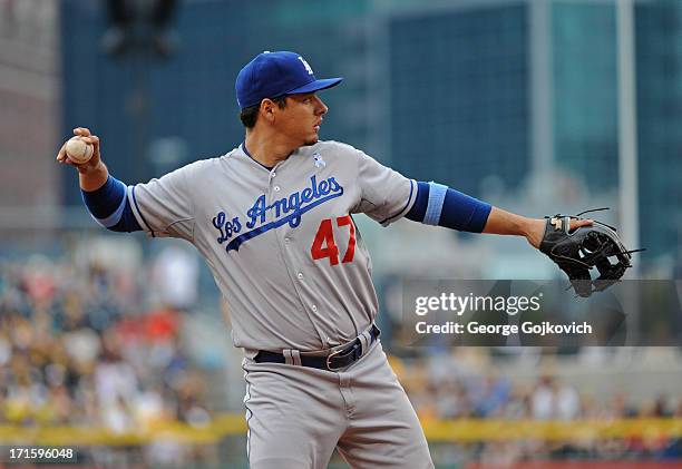 Third baseman Luis Cruz of the Los Angeles Dodgers throws during a game against the Pittsburgh Pirates at PNC Park on June 16, 2013 in Pittsburgh,...