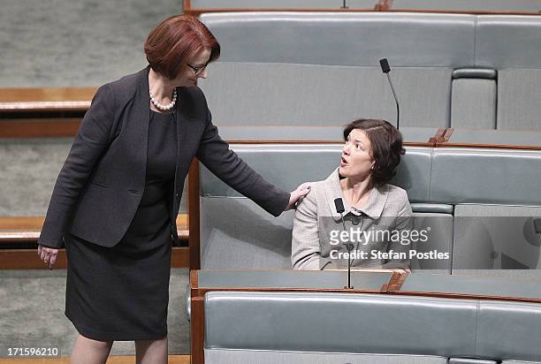 Former PM Julia Gillard greets friend and MP, Kirsten Livermore in the House of Representatives on June 27, 2013 in Canberra, Australia. Kevin Rudd...