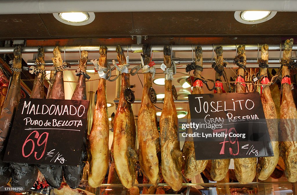 Iberian hams for sale in market place