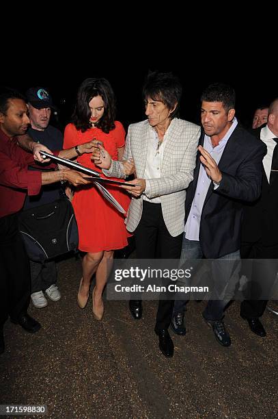 Sally Humphreys and Ronnie Wood sighting leaving the Serpentine Summer Party on June 26, 2013 in London, England.