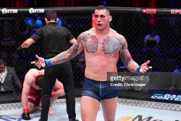 Rodolfo Bellato of Brazil reacts after his TKO victory against Murtaza Talha of Russia in a light heavyweight fight during Dana White's Contender...