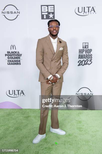 Young Fly arrives at the BET Hip Hop Awards at Cobb Energy Performing Arts Center on October 03, 2023 in Atlanta, Georgia.