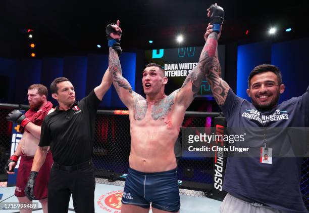 Rodolfo Bellato of Brazil reacts after his TKO victory against Murtaza Talha of Russia in a light heavyweight fight during Dana White's Contender...
