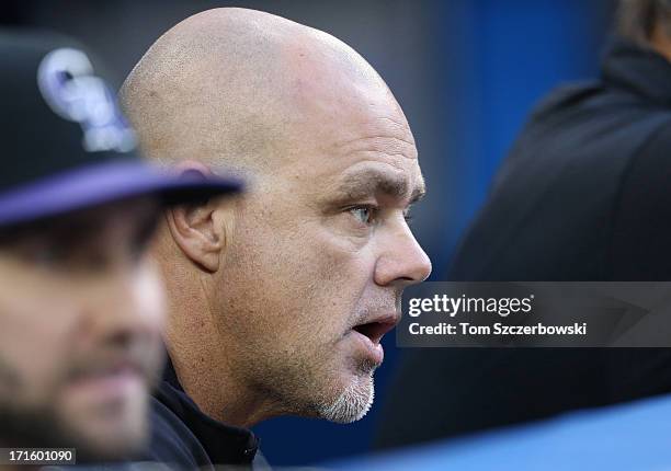 Hitting coach Dante Bichette of the Colorado Rockies looks on during MLB game action against the Toronto Blue Jays on June 18, 2013 at Rogers Centre...