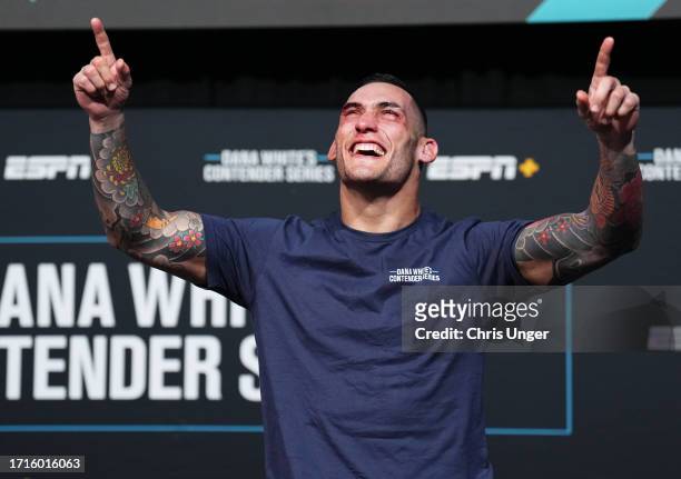 Rodolfo Bellato of Brazil reacts after being awarded a UFC contract during Dana White's Contender Series season seven, week nine at UFC APEX on...