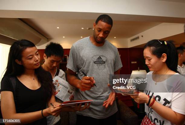 Tracy McGrady of the San Antonio Spurs attends a press conference at Nanhai Hotel on June 26, 2013 in Shenzhen, China.