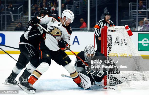 Cam Talbot of the Los Angeles Kings makes a save against Max Jones of the Anaheim Ducks in the first period of a preseason game at Crypto.com Arena...