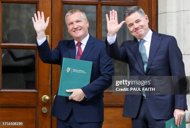 Ireland's Finance Minister Michael McGrath and Ireland's Public Expenditure Minister Paschal Donohoe, pose during a photocall prior to presenting the...