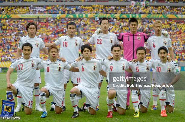 Japan pose for a team group before the start of the FIFA Confederations Cup Brazil 2013 Group A match between Brazil and Japan at the National...