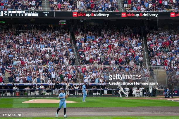 General view as Royce Lewis of the Minnesota Twins bats and hits a home run off of Kevin Gausman of the Toronto Blue Jays during game one of the Wild...
