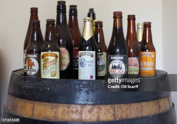 Old bottles of beer on display in Adnams brewery on June 25, 2013 in Southwold, England. Established in the small Suffolk coastal town of Southwold...