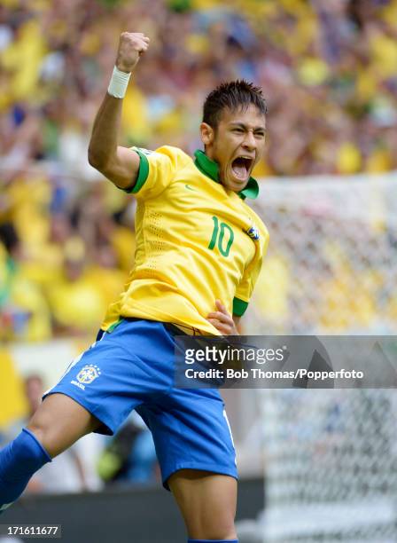 Neymar of Brazil celebrates his goal during the FIFA Confederations Cup Brazil 2013 Group A match between Brazil and Japan at the National Stadium on...