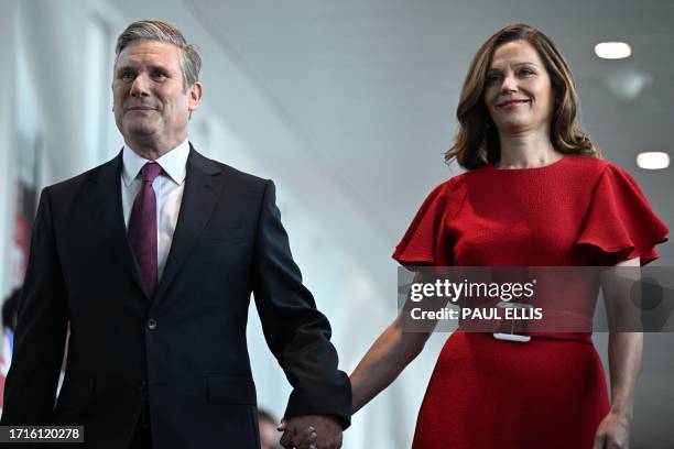 Britain's main opposition Labour Party leader Keir Starmer and his wife Victoria Starmer arrive on the third day of the annual Labour Party...