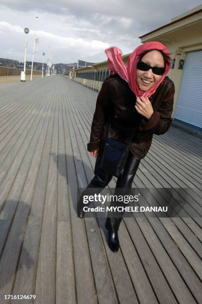 Taiwan's actress Lu Yi-Ching pose before the presentation of Taiwan film maker Cheng Wen-Tang's film "Blue Cha Cha" as part of the 8th Asian film...