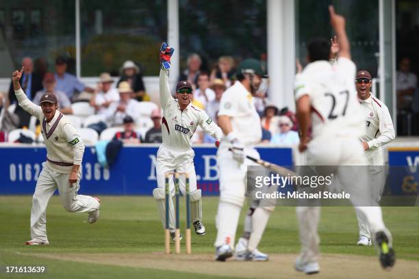 Ed Cowan of Australia is caught behind by wicketkeeper Alex Barrow off the bowling of Gemaal Hussain during day two of the Somerset versus Australia...