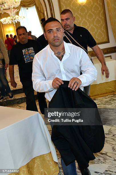 Fabrizio Miccoli leaves after a press conference at Excelsior Palace Hotel on June 27, 2013 in Palermo, Italy.