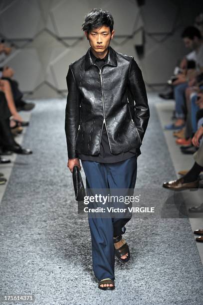 Model walks the runway at the Z Zegna show during Milan Menswear Fashion Week Spring Summer 2014 on June 25, 2013 in Milan, Italy.