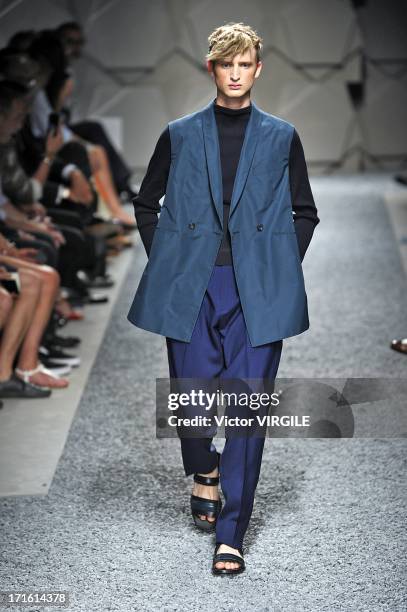 Model walks the runway at the Z Zegna show during Milan Menswear Fashion Week Spring Summer 2014 on June 25, 2013 in Milan, Italy.