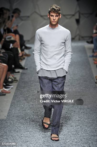 Model walks the runway at the Z Zegna show during Milan Menswear Fashion Week Spring Summer 2014 on June 25, 2013 in Milan, Italy.