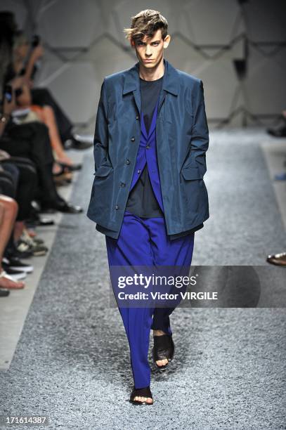 Model walks the runway at the Z Zegna show during Milan Menswear Fashion Week Spring Summer 2014 on June 25, 2013 in Milan, Italy.