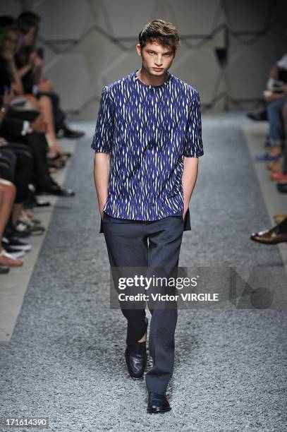 Model walks the runway at the Z Zegna show during Milan Menswear Fashion Week Spring Summer 2014 on June 25, 2013 in Milan, Italy.