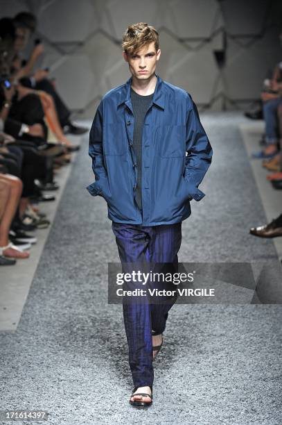 Model walks the runway at the Z Zegna show during Milan Menswear Fashion Week Spring Summer 2014 on June 25, 2013 in Milan, Italy.