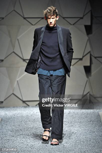 Model walks the runway at the Z Zegna show during Milan Menswear Fashion Week Spring Summer 2014 on June 25, 2013 in Milan, Italy.