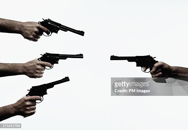 three guns against one - 拳銃 ストックフォトと画像