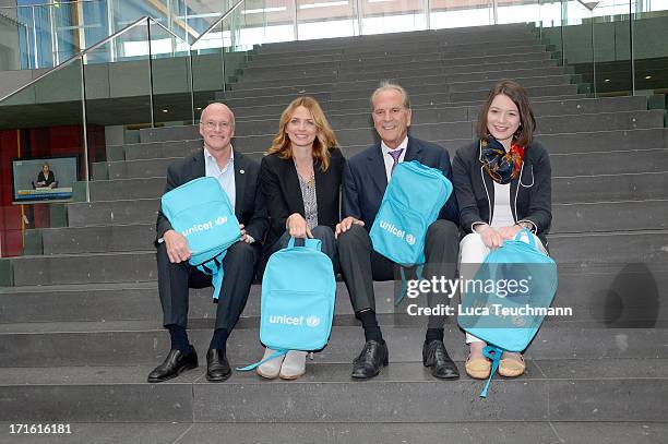 Dan Toole; Eva Padberg; Jurgen Heraeus and Sophie Lemmer attend 60 Years UNICEF Germany Press Conference at Federal Press Conference on June 27, 2013...