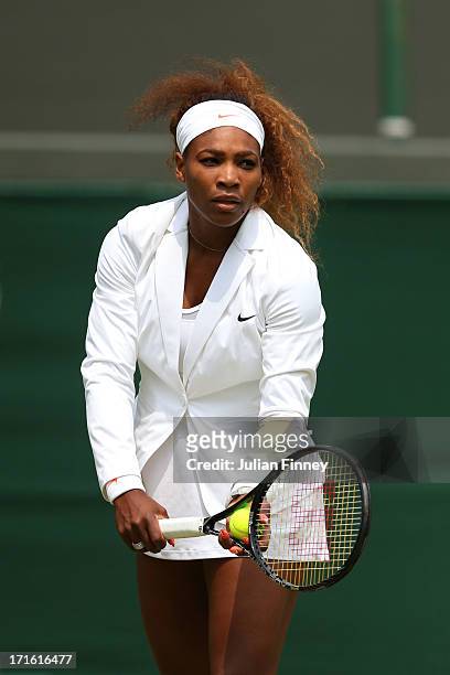 Serena Williams of the United States of America warms up before the Ladies' Singles second round match against Caroline Garcia of France on day four...