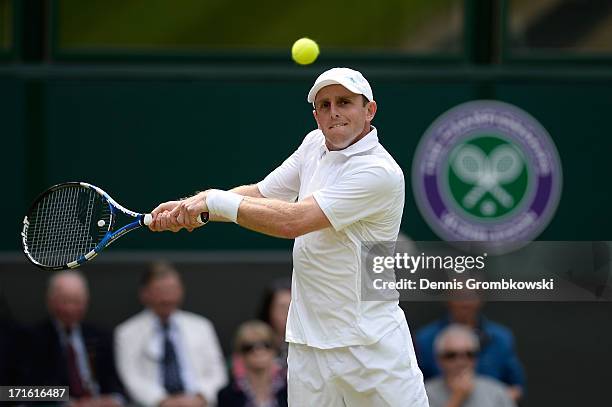 Jesse Levine of Canada plays a backhand during his Gentlemen's Singles second round match against Juan Martin Del Potro of Argentina on day four of...